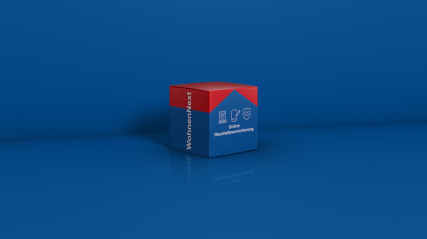 Symbolisches Haus in Form einer blauen Box mit rotem Dach auf einfarbig blauem Hintergrund – steht für sicheren Wohnraum und bewirbt die Wohnen Next Haushaltsversicherung. 